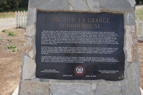 [Picture of Old Schoolhouse plaque]